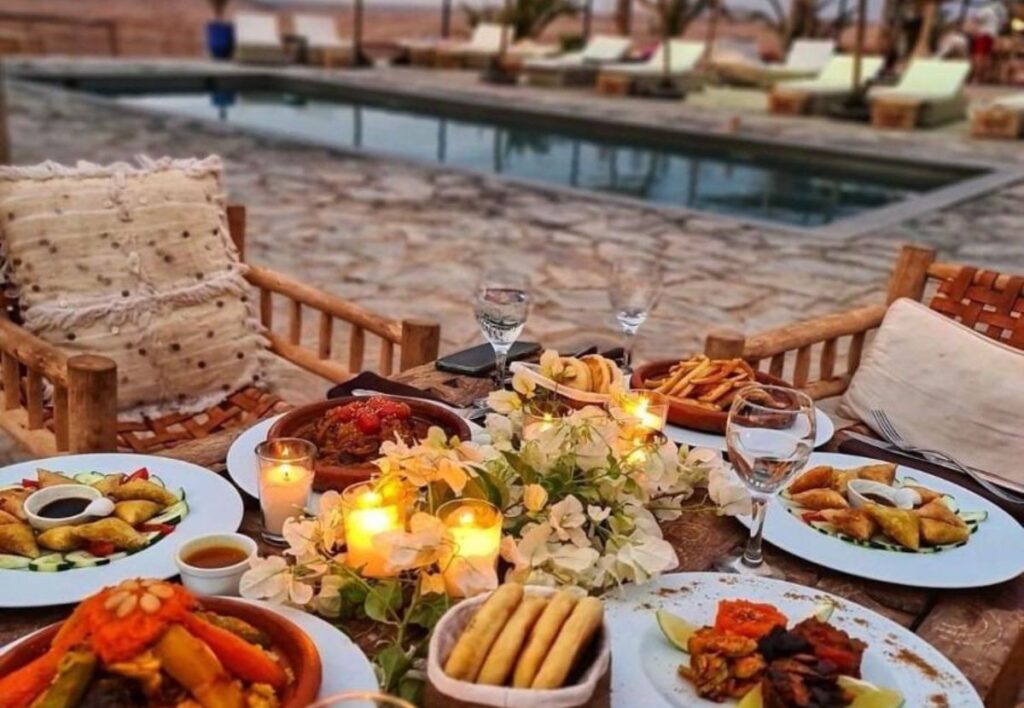 Agafay desert tours: Traditional Moroccan dinner setup in Agafay Desert