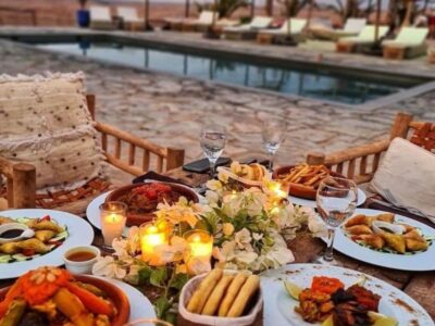 Agafay desert tours: Traditional Moroccan dinner setup in Agafay Desert