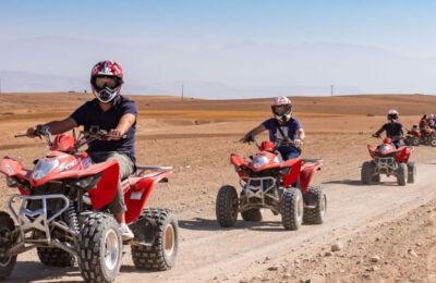 Group of travelers riding quad bikes in Agafay Desert