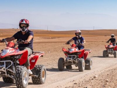 Group of travelers riding quad bikes in Agafay Desert