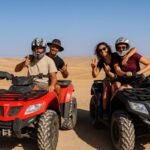 Camel caravan tour in Agafay Desert near Marrakech during golden hour
