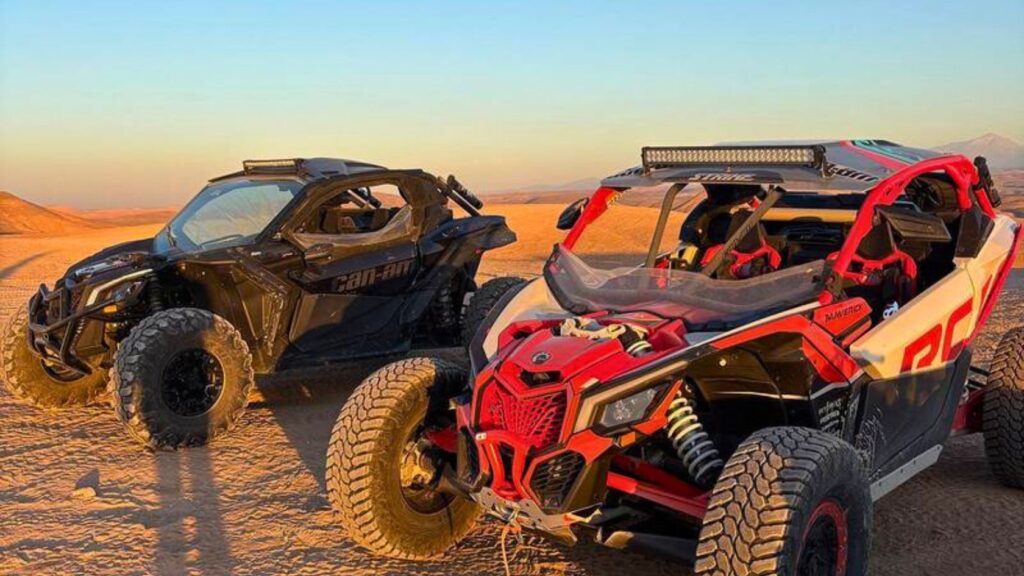 Group of travelers on a guided buggy excursion across the Agafay Desert near Marrakech, Morocco.