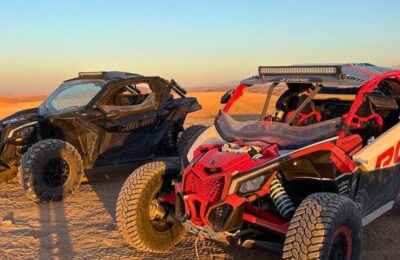 Group of travelers on a guided buggy excursion across the Agafay Desert near Marrakech, Morocco.